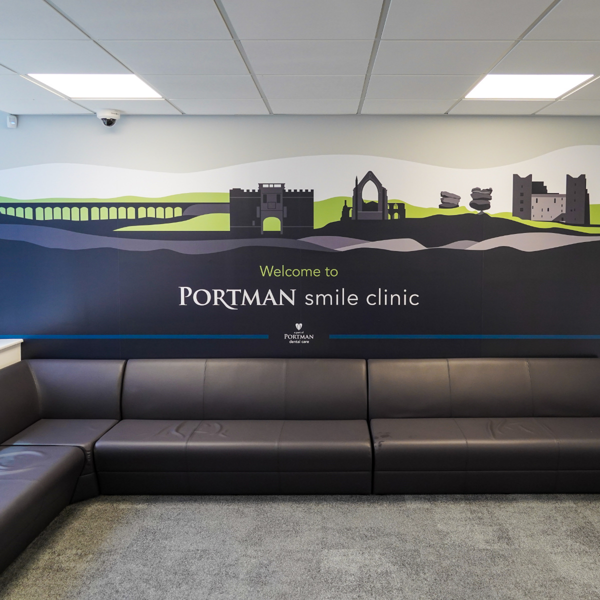 Portman dental branded wall mural featuring local landmarks on the waiting room wall at Portman Smile Clinic Ilkley